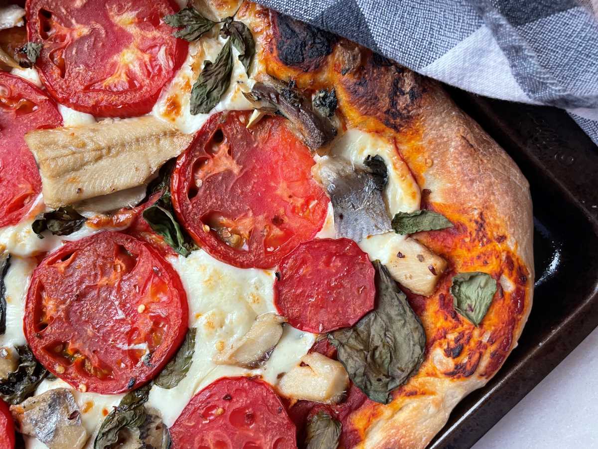 Pizza siciliana (pizza with sardines), Sicily, Italy, Stock Photo