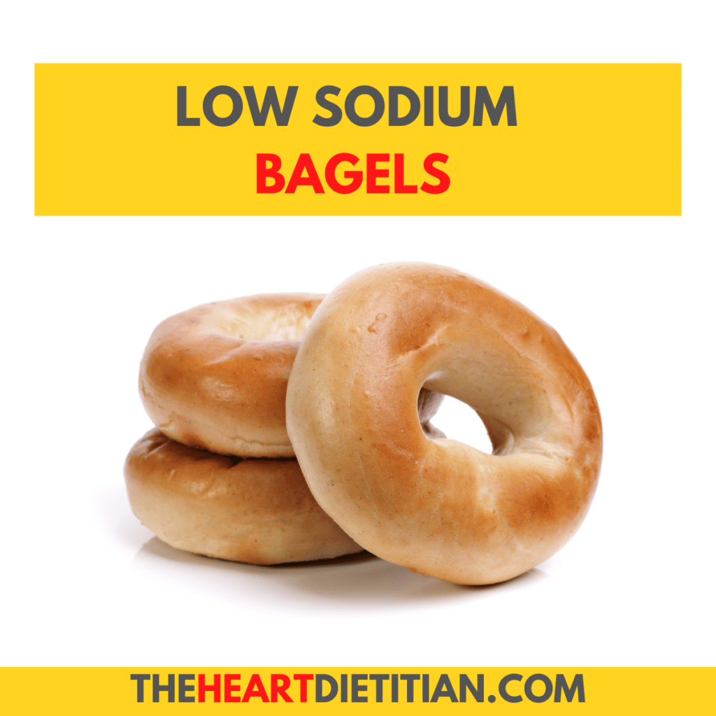Picture of two bagels stacked and one leaning up beside it with the words low sodium bagels.
