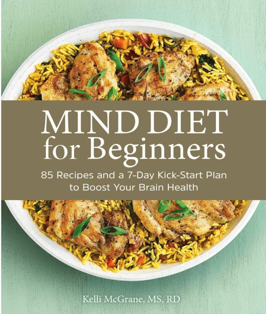 A cookbook called "MIND Diet For Beginners". The cookbook has an image of chicken and vegetable fried rice on the cover.
