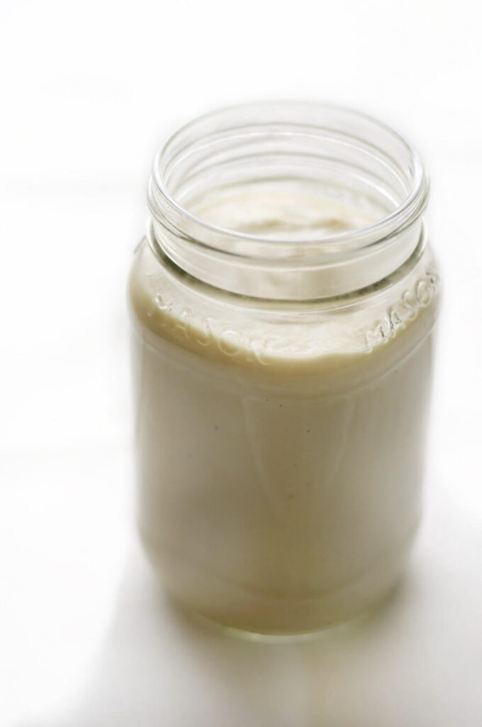 White low sodium sauce presented in a mason jar.