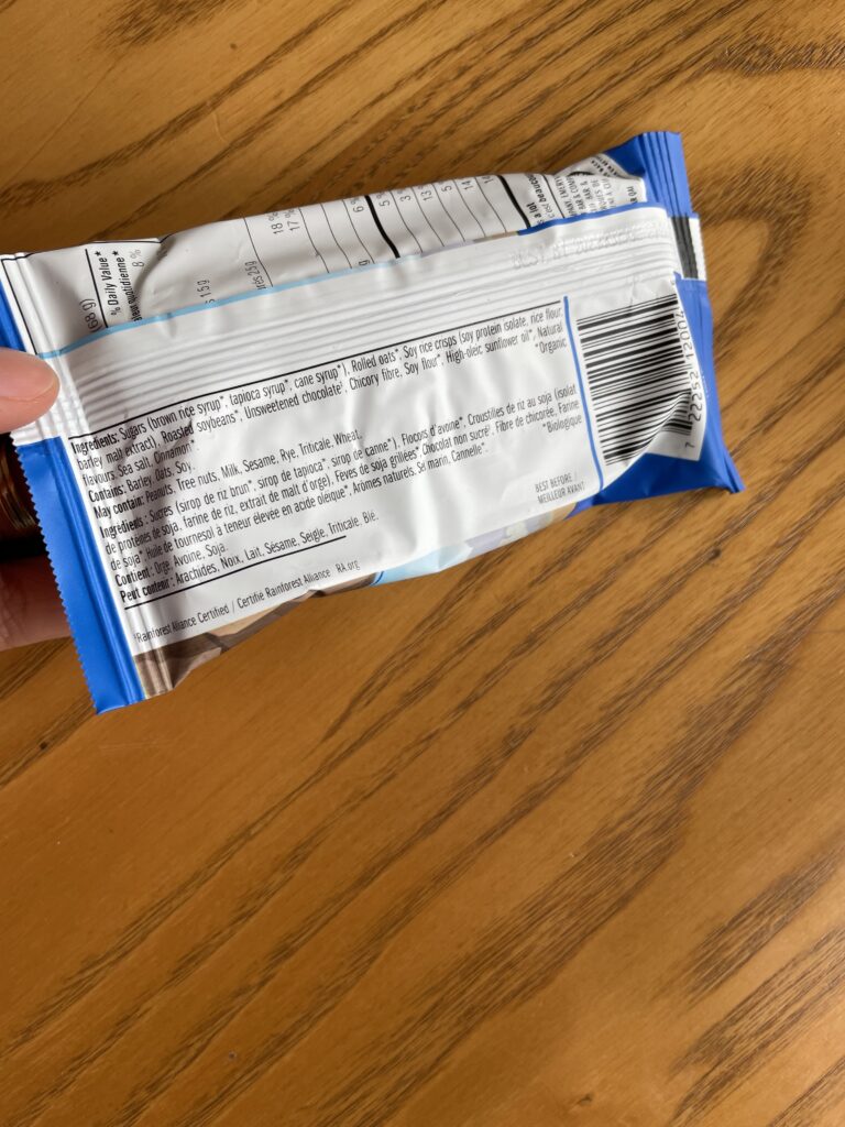 Cliff ingredient list low sodium protein bar label on a wood background.