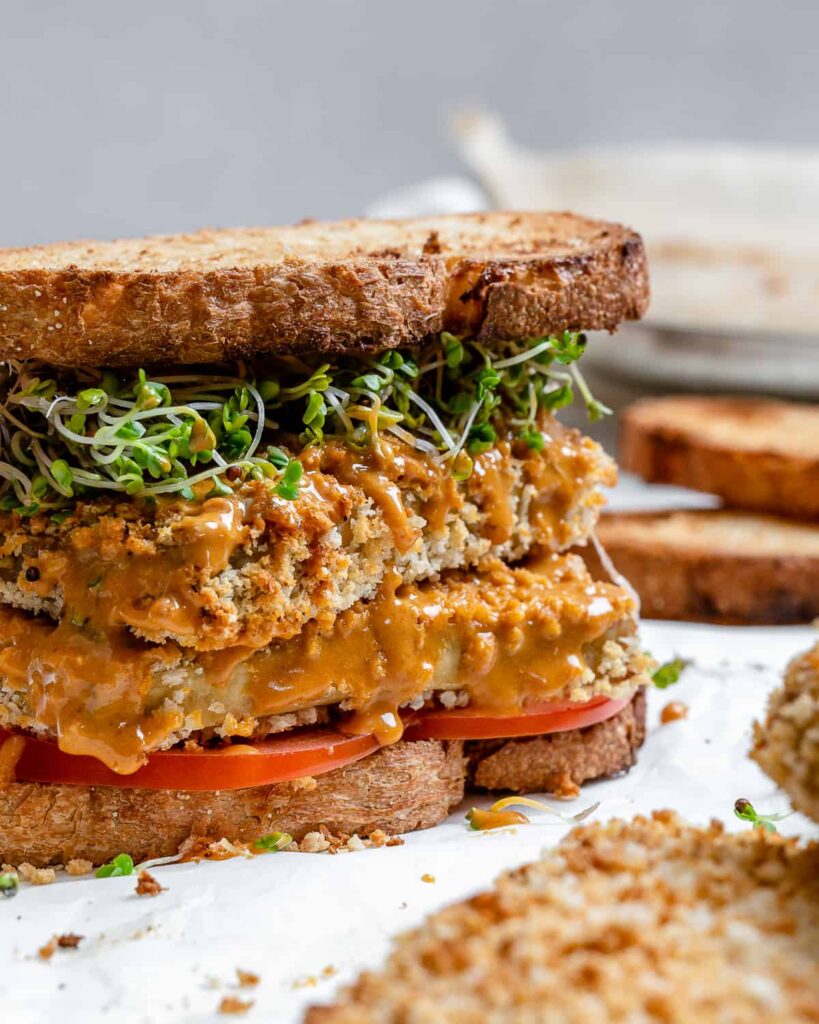 Buffalo tofu sandwich pictured close up. 