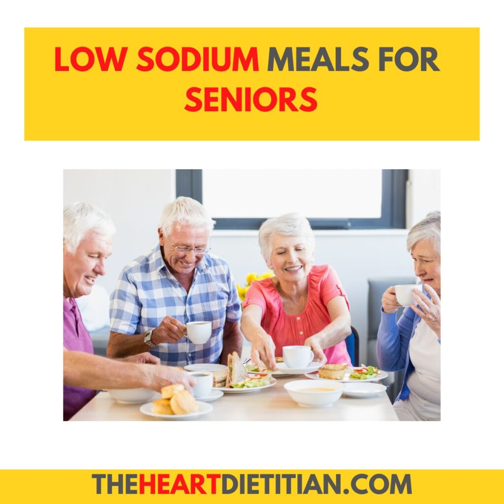 Low sodium meals for seniors title with a picture of four seniors enjoying a meal together at a table.
